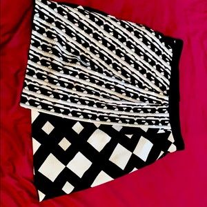Two graphic black and white skirts